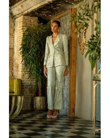Conjunto Isabela Aqua elegante con pantalón y chaqueta.